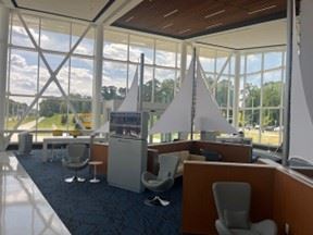 Floor to ceiling windows allow natural light inside the passenger waiting area